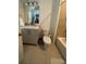 Cozy bathroom with shower, tub and vanity sink with updated fixtures at 12673 Yoshino Aly, Orlando, FL 32827