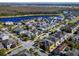 Beautiful aerial view of a Primary planned community with lake, landscaping, and modern homes at 14129 Walcott Ave, Orlando, FL 32827