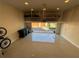 Clean and spacious garage with overhead storage, plenty of space for vehicles, and good lighting at 14129 Walcott Ave, Orlando, FL 32827