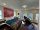 Spacious main bedroom with hardwood floors, large windows, and modern decor at 14129 Walcott Ave, Orlando, FL 32827