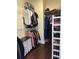 Well-organized walk-in closet with shelving, hanging rods, and ample storage space at 14129 Walcott Ave, Orlando, FL 32827