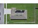 Aerial view showcases solar panels and expansive backyard space, highlighting the property's features at 14419 Topaghan Way, Winter Garden, FL 34787