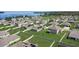 Aerial view of a single Gathering home with solar panels and fenced yard at 14419 Topaghan Way, Winter Garden, FL 34787