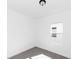 Bedroom with gray carpet, white walls, and a window at 1449 Monte Carlo Trl, Orlando, FL 32805