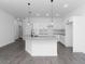 Spacious kitchen features white cabinets, granite countertops, and stainless steel appliances at 1449 Monte Carlo Trl, Orlando, FL 32805