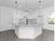 Bright kitchen features modern appliances, granite counters, and white cabinets at 1449 Monte Carlo Trl, Orlando, FL 32805