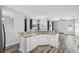 Inviting kitchen with counter seating and backyard views at 213 Strathmore Cir, Kissimmee, FL 34744