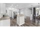 Open kitchen featuring stainless steel appliances and granite counters at 213 Strathmore Cir, Kissimmee, FL 34744