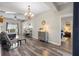 Well-lit living room with a view to the bedroom entrance at 213 Strathmore Cir, Kissimmee, FL 34744