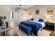 Spacious main bedroom with wood floors, sitting area, and en-suite bathroom access at 213 Strathmore Cir, Kissimmee, FL 34744