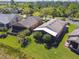 An aerial shot showcasing meticulously maintained yards and community landscaping with palm trees at 238 Acadia Dr, Poinciana, FL 34759