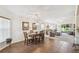 Open-concept dining room and living area with tile floors and bright natural light at 238 Acadia Dr, Poinciana, FL 34759