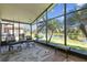 Enjoy the view from this patio with comfortable seating and scenic water view at 238 Acadia Dr, Poinciana, FL 34759