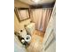 The bathroom features a white vanity and toilet with beige wall tiles at 2406 Thelma Ave, Haines City, FL 33844