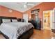 Bedroom with a ceiling fan, and a closet with a full size bed at 2432 Olive Branch Way, Orlando, FL 32817