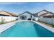 Backyard pool with a view of the home at 2432 Olive Branch Way, Orlando, FL 32817