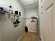 Walk-in closet featuring metal shelving and ceramic tile flooring at 2787 Oakwater Dr # 149, Kissimmee, FL 34747