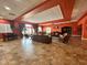 Expansive clubhouse lounge area with comfortable seating, offering a welcoming space for social gatherings and events at 2787 Oakwater Dr # 149, Kissimmee, FL 34747