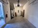 Spacious two car garage, featuring bright lighting and ample room for storage and organization at 2787 Oakwater Dr # 149, Kissimmee, FL 34747