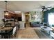 Open concept living and dining space features tiled floors and stylish decor at 2787 Oakwater Dr # 149, Kissimmee, FL 34747