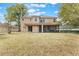 Expansive backyard featuring a covered patio, offering great outdoor living and entertaining space at 30439 Gidran Ter, Mount Dora, FL 32757
