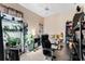 Bright bedroom setup with lots of room and plants, including a desk, and shelves at 310 N Hampton Dr, Davenport, FL 33897