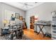 Bonus room with musical instruments, hardwood floors, and a ceiling fan at 310 N Hampton Dr, Davenport, FL 33897