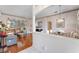 Elegant living and dining areas featuring hardwood floors and neutral decor at 310 N Hampton Dr, Davenport, FL 33897