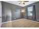 Neutral bedroom showcasing wall to mount a TV, standard closet, and plush carpeting at 3131 Bass Boat Way, Kissimmee, FL 34746