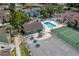 Aerial view of community pool, tennis court, playground, and picnic area at 3161 Britannia Blvd # A, Kissimmee, FL 34747