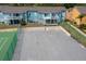 Outdoor basketball court surrounded by apartment buildings and fencing at 3161 Britannia Blvd # A, Kissimmee, FL 34747
