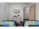 Comfortable bedroom with closet and a television for entertainment at 3161 Britannia Blvd # A, Kissimmee, FL 34747