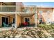 Exterior view of multi-Gathering unit with patios, balconies, and outdoor seating at 3161 Britannia Blvd # A, Kissimmee, FL 34747