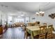 Open living and dining areas featuring hardwood floors, neutral tones, and ample natural light at 3161 Britannia Blvd # A, Kissimmee, FL 34747
