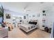 This bedroom has modern decor, carpet floors, and natural lighting at 3263 Lorimar Ln, St Cloud, FL 34772