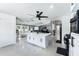 Open concept kitchen with island that connects to dining and living areas at 3263 Lorimar Ln, St Cloud, FL 34772