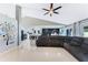 Living room with tile flooring and neutral décor and an open concept design at 3263 Lorimar Ln, St Cloud, FL 34772