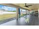 This patio has screened windows and an outdoor entertaining space at 3263 Lorimar Ln, St Cloud, FL 34772