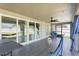 This patio has screened windows and an outdoor seating area at 3263 Lorimar Ln, St Cloud, FL 34772