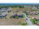 Aerial view of a meticulously designed community featuring homes with private pools and views of natural landscapes at 362 Villa Sorrento Cir, Haines City, FL 33844