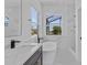 Bright bathroom showcasing a soaking tub, a walk-in shower and a dark vanity at 362 Villa Sorrento Cir, Haines City, FL 33844
