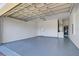 Clean two-car garage with epoxy floors and plenty of storage space at 362 Villa Sorrento Cir, Haines City, FL 33844