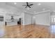 Spacious living area with wood-look flooring, an open concept, and abundant natural light at 362 Villa Sorrento Cir, Haines City, FL 33844