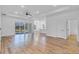 Spacious living room with backyard access and open to the kitchen, ideal for modern living at 362 Villa Sorrento Cir, Haines City, FL 33844