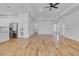 Bright living room boasts modern floors, recessed lighting and ample space for entertaining and comfort at 362 Villa Sorrento Cir, Haines City, FL 33844