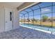 Covered lanai overlooks the refreshing swimming pool at 362 Villa Sorrento Cir, Haines City, FL 33844