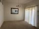 Bright dining room with carpet, a chandelier, curtains and a wall mirror at 366 Jaybee Ave, Davenport, FL 33897
