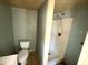 Bathroom featuring a toilet and a shower stall at 4226 Lake Richmond Dr, Orlando, FL 32811