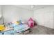 Playful bedroom with a fun decor, ceiling fan, creating a vibrant space for relaxation and play at 4623 Wandsworth Way, Davenport, FL 33837