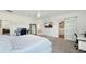 Spacious bedroom with a walk-in closet, work space, and a serene atmosphere at 4623 Wandsworth Way, Davenport, FL 33837
